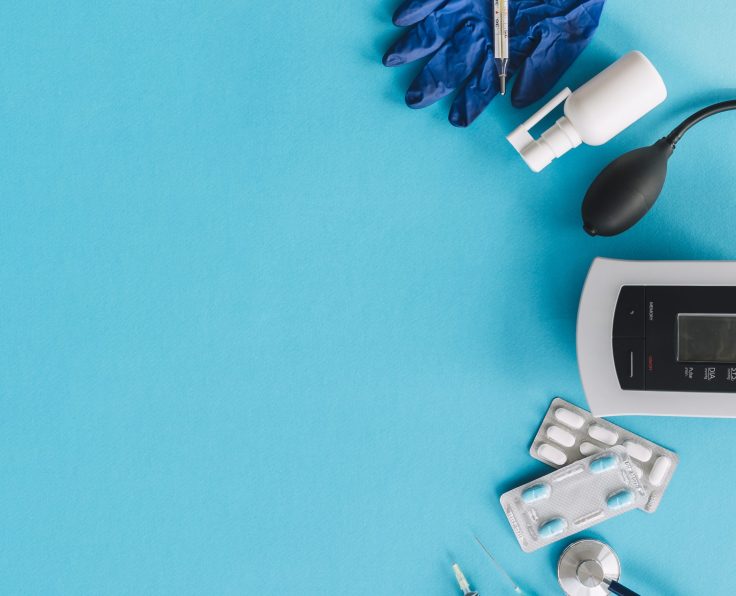 various-medical-equipments-blue-backdrop